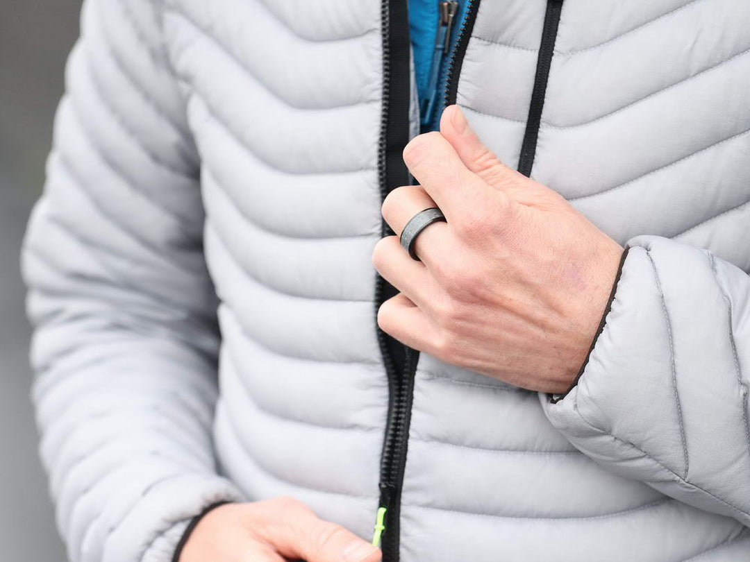 Boston carbon fiber and concrete ring on hand