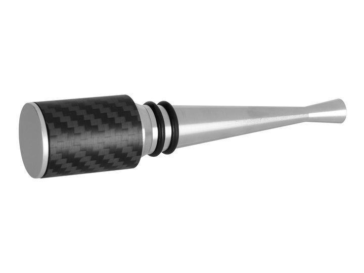 Close-up view of the Farfalli Wine Stopper's carbon fiber top, displaying the intricate twill weave pattern with a matte finish.