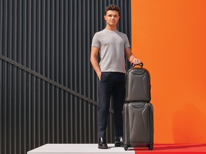 Lando Norris with carbon fiber Tumi bags