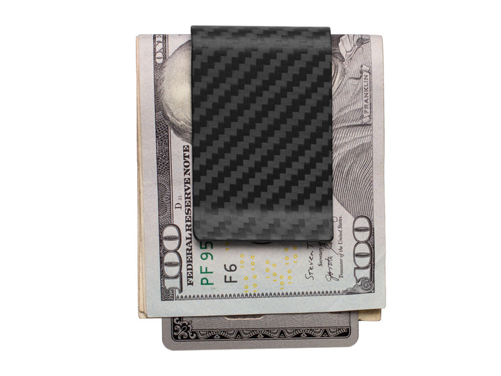 Carbon fiber money clip holding cash and cards