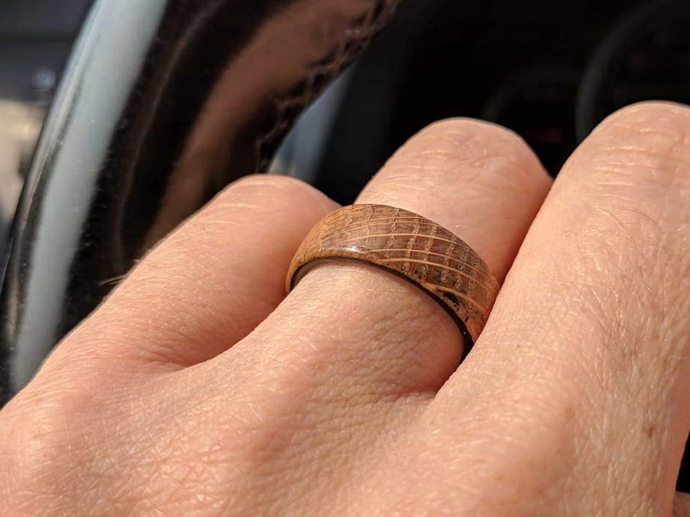 Distiller Carbon Fiber & Reclaimed Whiskey Barrel Ring by Element Ring Co., on hand