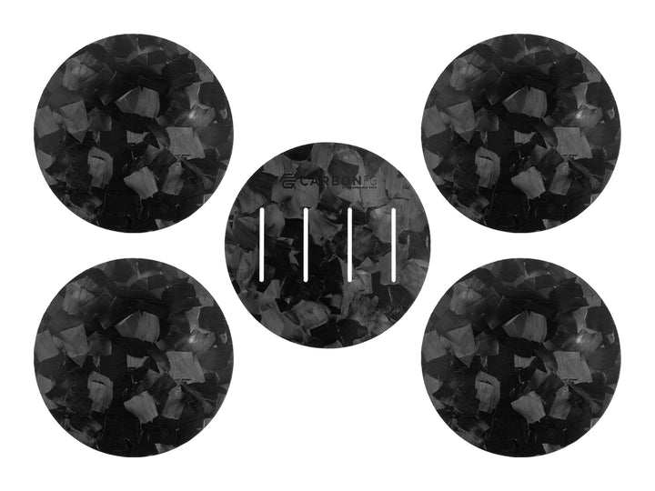 Four CarbonFG forged carbon fiber coasters and base with a distinct marbled design, exuding modern elegance and supercar-grade material.
