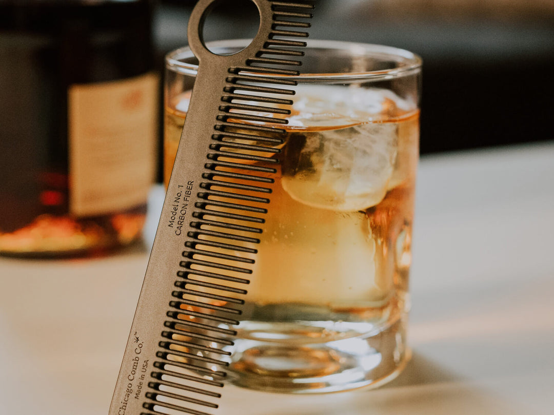Chicago Comb Co Model No. 1 carbon fiber comb with drink