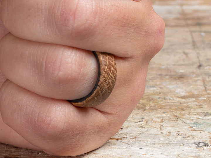 Distiller carbon fiber whiskey ring on hand