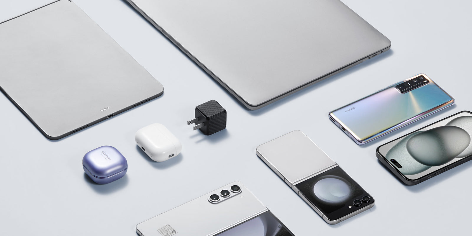 Carbon fiber USB C charger with a variety of devices it can charge